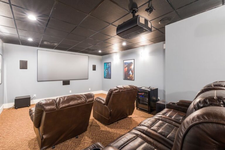 Choosing the Right Projector Screen Mount: Wall vs. Ceiling